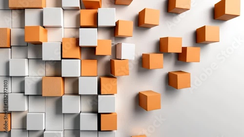 Abstract arrangement of orange and white cubes creating a modern design on a clean background