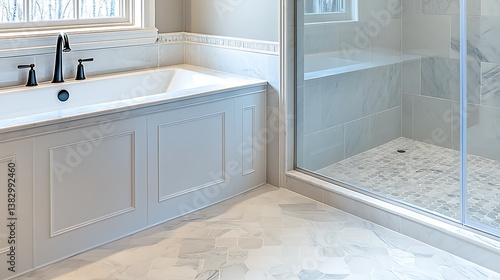 A clean and modern bathroom featuring a bathtub and shower
