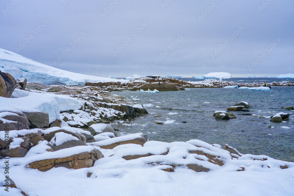 Cape Reclus near Portal Point, a narrow point that served as a gateway to the continental plateau of Antarctica in 1956 when a refuge was established on its coast