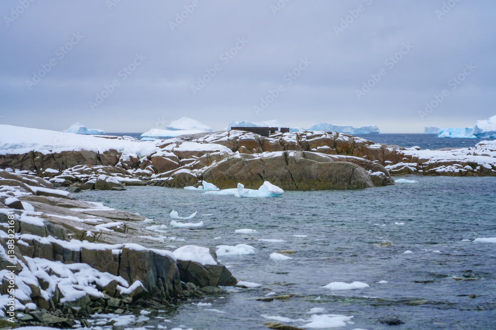 Remains of the Cape Reclus Refuge, a former hut that served as a gateway to the continental plateau of Antarctica in 1956 on Portal Point, a narrow point of the Reclus Peninsula