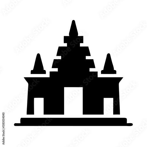 Black silhouette of stepped temple building with spires