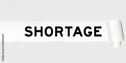 Ripped gray paper background that have word shortage under torn part