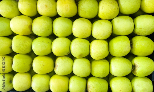 Foto collection of green apples, closely packed together and forming a grid pattern