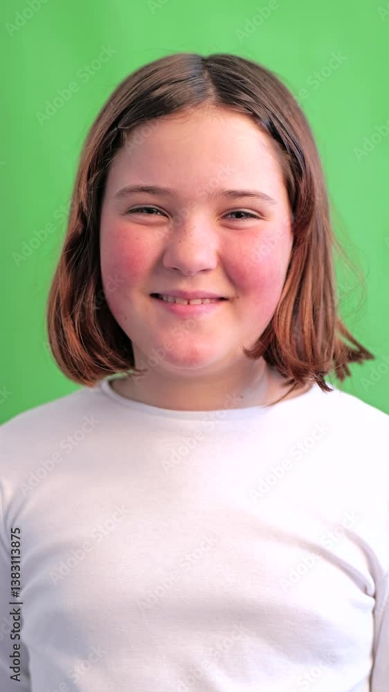 Cute girl smiles and interacts with the camera Cute girl smiles and interacts with the camera
