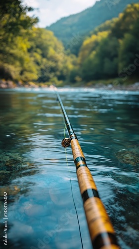 Fishing Rod Rests on the Surface of a Calm River Surrounded by Lush Greenery