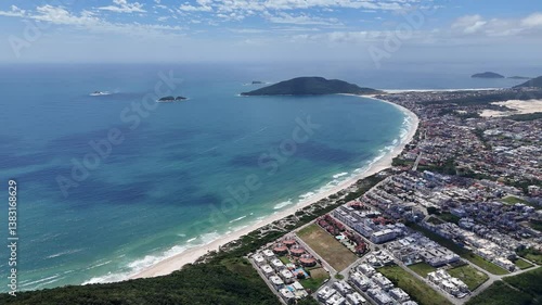 Coastal view of a small town by the sea in Brazil with clear skies