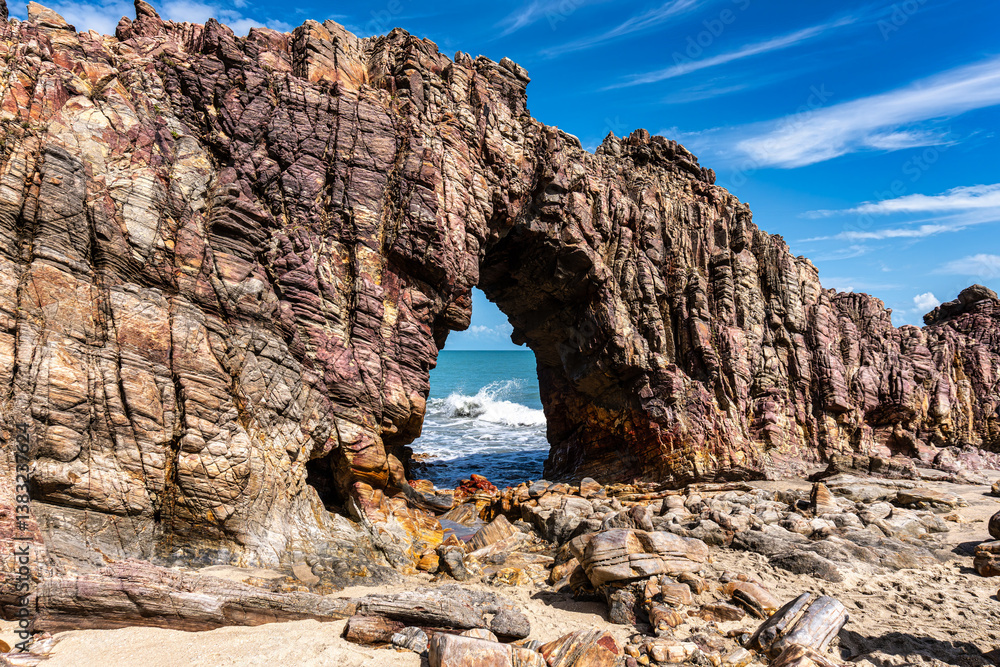 Pedra Furada. Famous touristic attraction on the beach of Jericoacoara, Ceara State, Brazil.