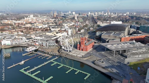 Orbiting aerial shot of Cardiff Bay with The Senedd, Welsh Government buildings