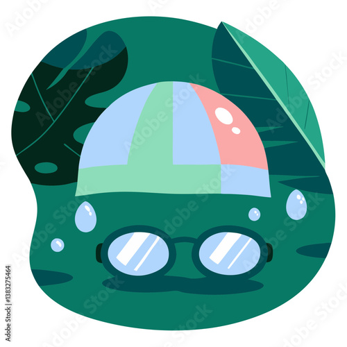Colorful swimmer's cap and goggles on green background  