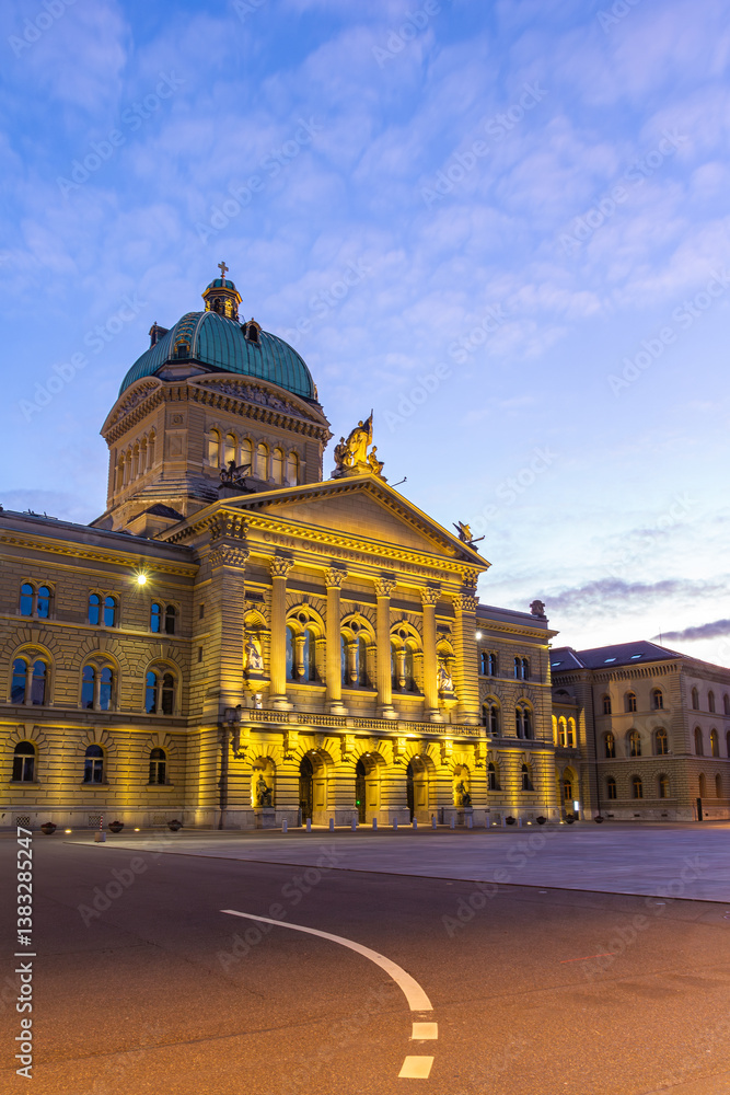 Naklejka premium Bern, Switzerland - December 26. 2020: The Swiss parliament building Bundeshaus in twilight, Bern, Switzerland