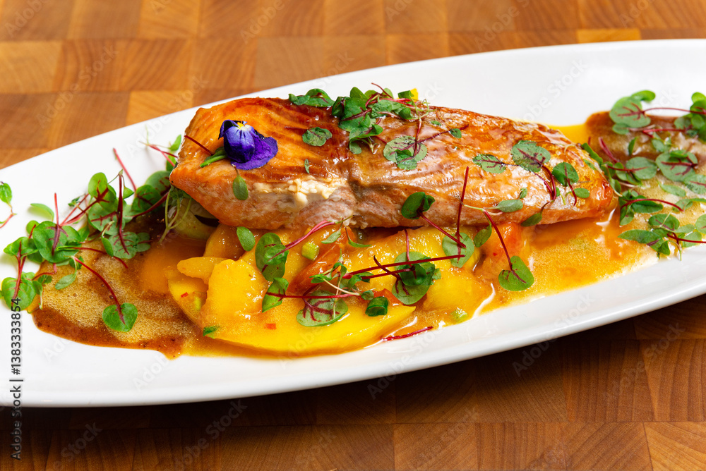 Gourmet salmon fillet with mango sauce. Gourmet salmon fillet with mango sauce.