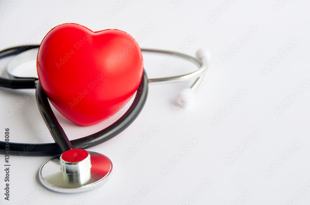 Close up view of stethoscope and a red heart shaped with customizable space for text. Medical and health concept Close up view of stethoscope and a red heart shaped with customizable space for text. Medical and health concept