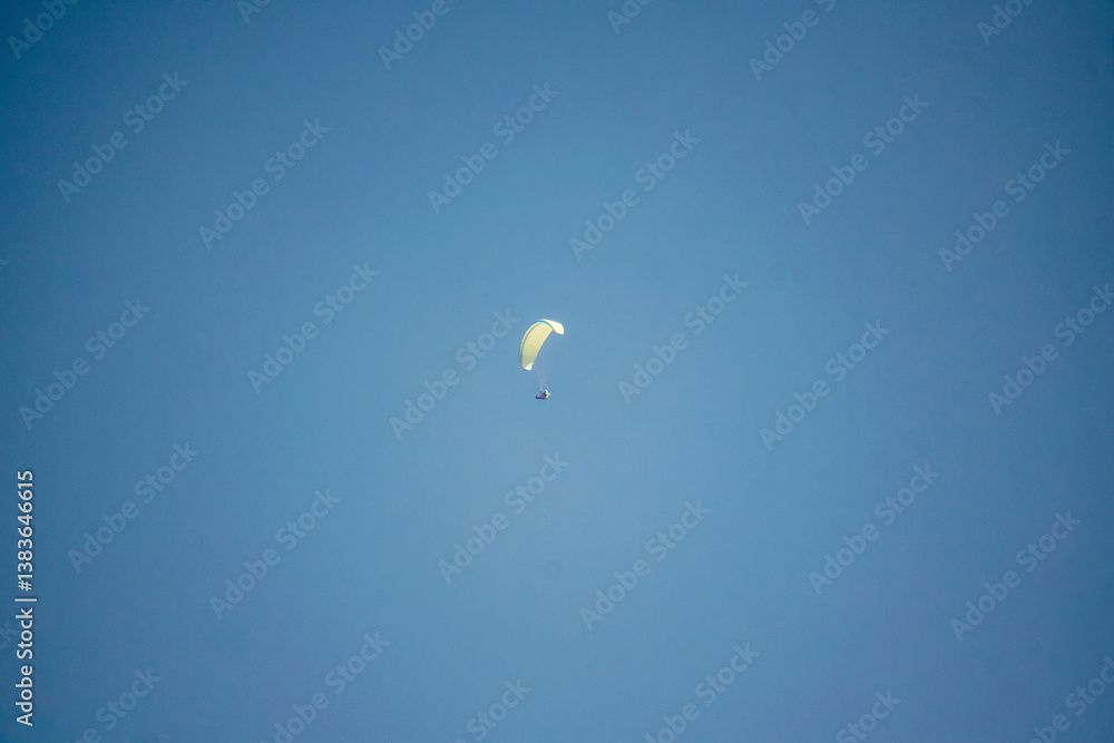 Paragliding in the blue sky Paragliding in the blue sky