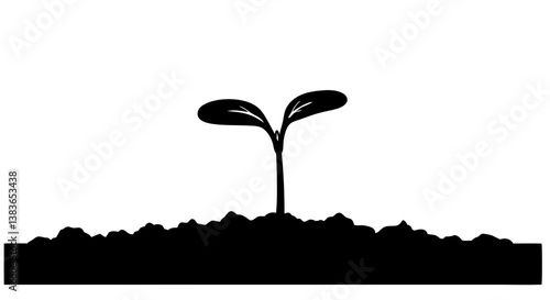 Seedling sprouting against dark soil background for Earth Day