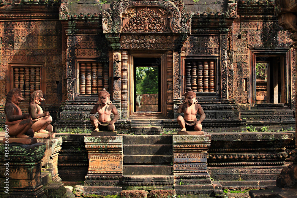 Obraz premium Banteay Srei - a 10th century Hindu temple dedicated to Shiva. The temple built in red sandstone was rediscovered 1814 in the jungle of the Angkor area of Cambodia