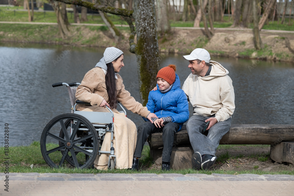 family with disabled mother in wheelchair, teenage son, father in cap, parenting, disability inclusion, trauma family with disabled mother in wheelchair, teenage son, father in cap, parenting, disability inclusion, trauma