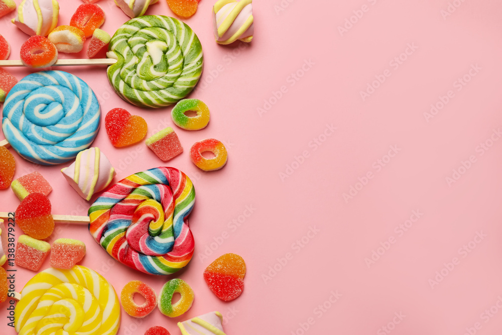Many different tasty candies and marshmallows on pink background, flat lay. Space for text