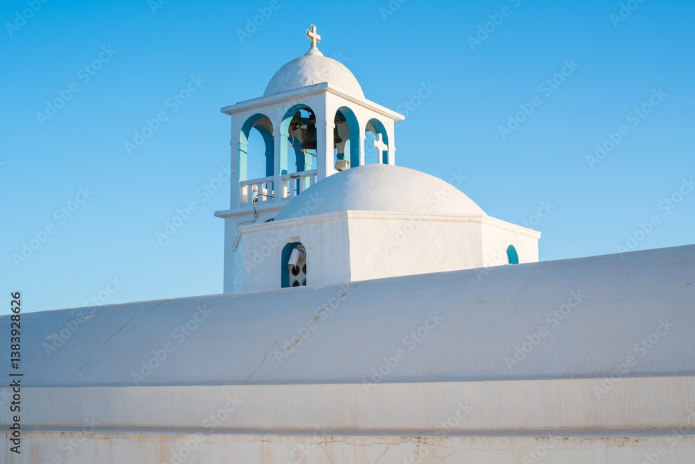 Whitewashed Greek church dome with blue sky in Triovasalos Whitewashed Greek church dome with blue sky in Triovasalos
