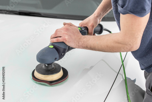 polishing a white car