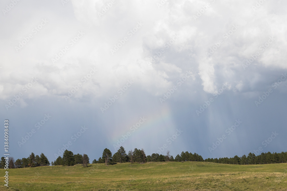 Landscape with clouds and rainbow Landscape with clouds and rainbow