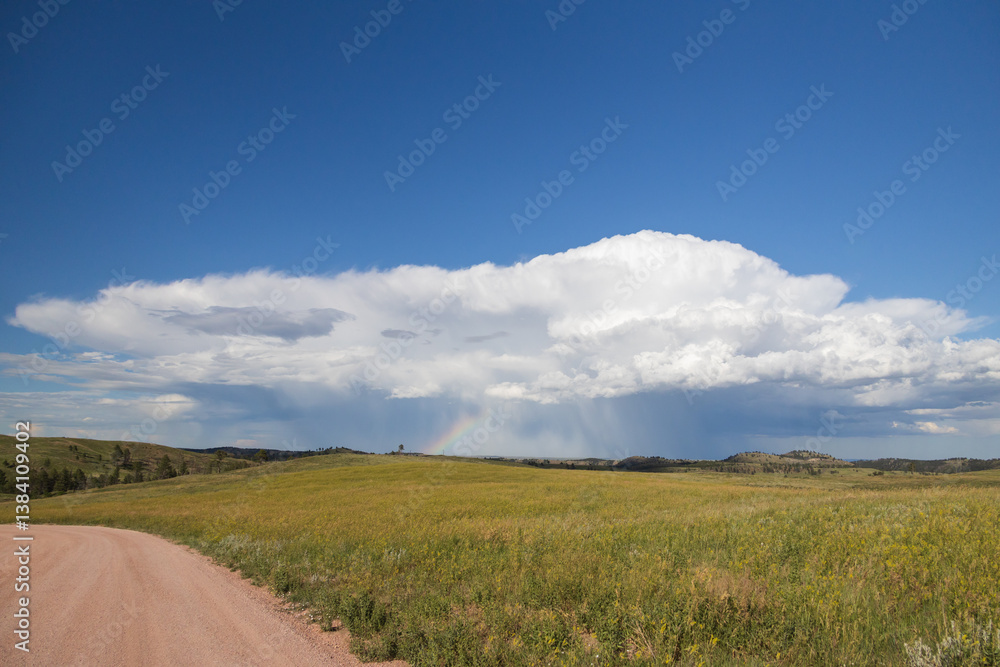 Fototapeta premium Clouds with rainbow