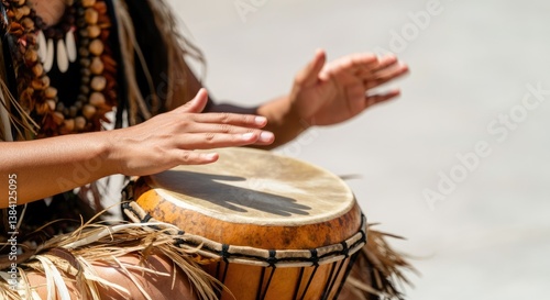 Wallpaper Mural Person playing hand drum, cultural attire, outdoor setting Torontodigital.ca