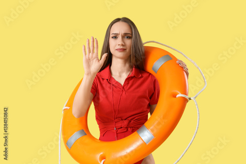 Young female lifeguard with...