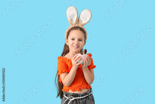 Cute little girl in bunny e...