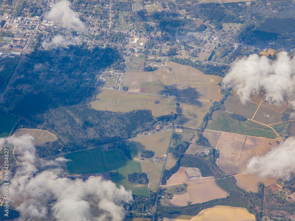 High altitude photograph of sky, clouds and landscape