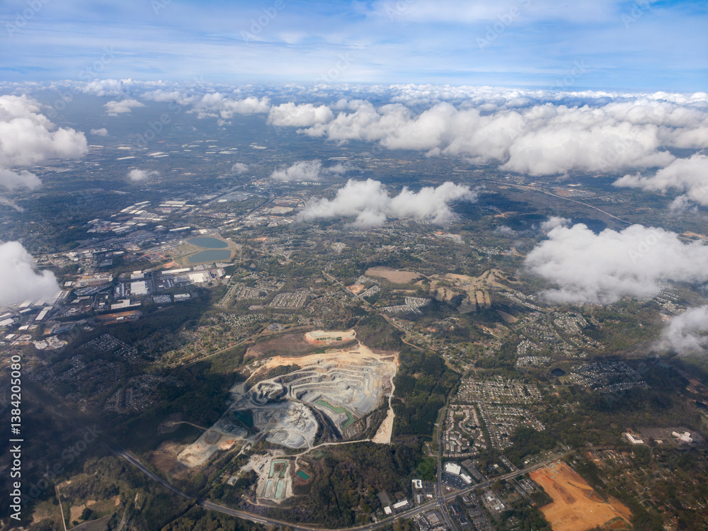 High altitude photograph of sky, clouds and landscape