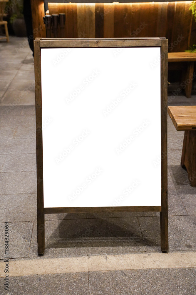 white blackboard advertising sign or customer stopper at sidewalk cafe