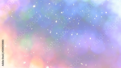 淡いパステルカラーのキラキラした光の丸ボケの背景　ひらひら舞い散る花びら　季節・春のイメージ
