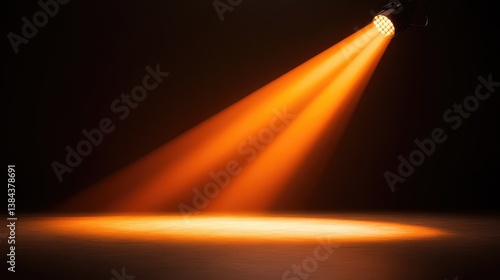 A dramatic orange spotlight on a dark stage, emphasizing a large empty space, with a focus on the warm beam of light. No text, no people.