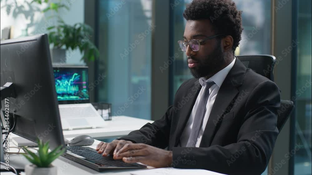 African American man typing computer working online job work businessman male looking at camera smiling showing thumb up gesture recommend approve guy business manager employee entrepreneur in office African American man typing computer working online job work businessman male looking at camera smiling showing thumb up gesture recommend approve guy business manager employee entrepreneur in office