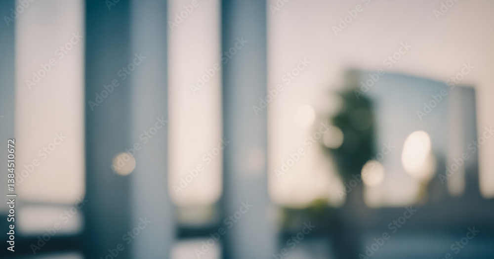 Blurry image depicting an urban scene viewed through a large glass wall with vertical supports, showing soft light and muted colors. Blurry image depicting an urban scene viewed through a large glass wall with vertical supports, showing soft light and muted colors.