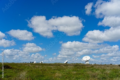Fototapeta Naklejka Na Ścianę i Meble -  Helston England - 11 June 2024 - Satellite dishes on the Goonhilly Satellite Earth Station on the Goonhillly Downs on the Lizard Peninsula in Cornwall England