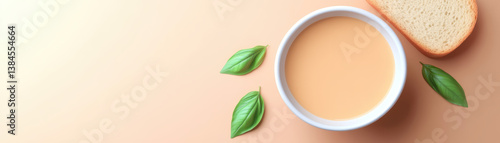 delicious plant based recipe featuring creamy soup served with slice of bread and fresh leaves, perfect for healthy meal