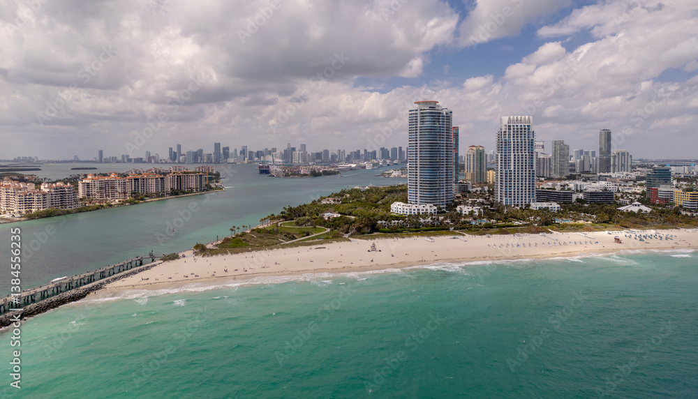 Miami Beach skyline. Sandy beaches of Miami. Miamis famous landmarks. South Pointe beach with skyscrapers. Miami city panorama. Miami skyline and ocean. South Florida. Vibrant South Beach. Miami Beach skyline. Sandy beaches of Miami. Miamis famous landmarks. South Pointe beach with skyscrapers. Miami city panorama. Miami skyline and ocean. South Florida. Vibrant South Beach.