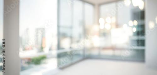 Bright and spacious office space in an unfocused view. Modern blurred background photo for banner, poster or magazine and website background.