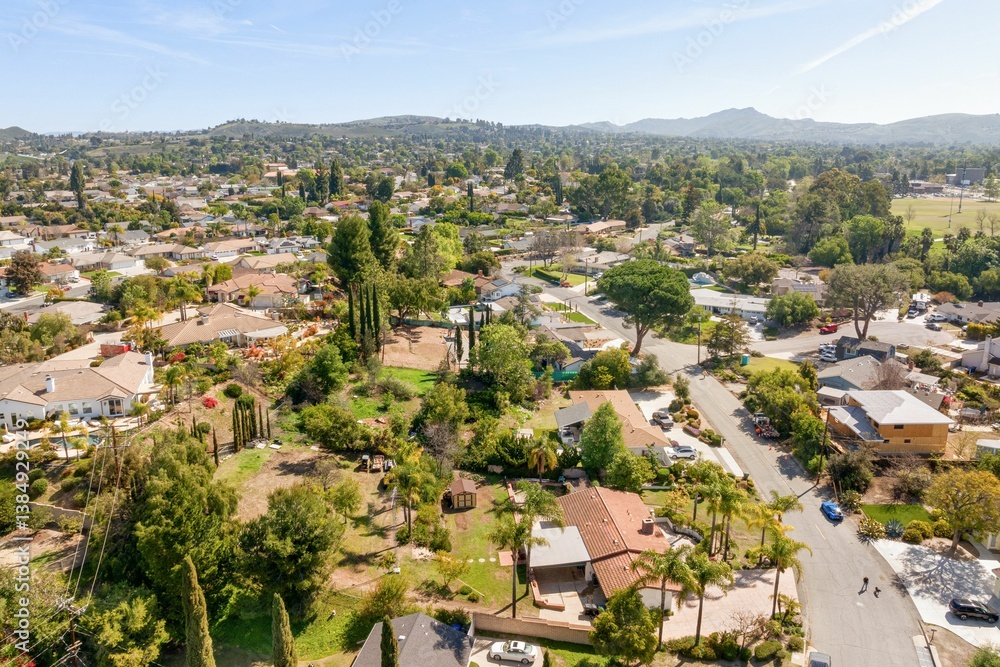 Fototapeta premium Spacious modern home with open layout, upgraded kitchen, light-filled bedrooms, scenic aerial views,