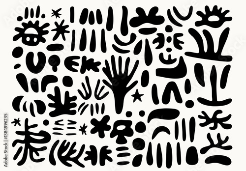 Abstract Black Ink Shapes: An artistic arrangement of black ink shapes on a neutral backdrop, inviting interpretation and stimulating the imagination.