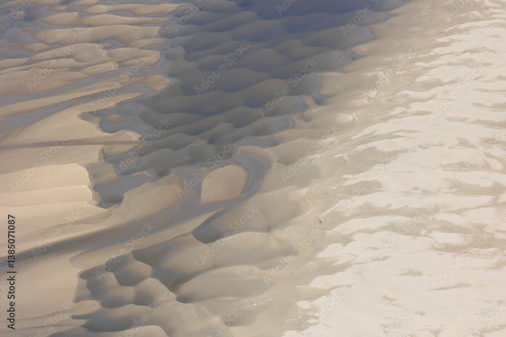 Background of sand dunes flooded with water