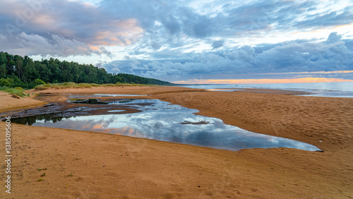 Fototapeta Naklejka Na Ścianę i Meble -  Beach by the Baltic Sea with a lagoon on a calm summer evening