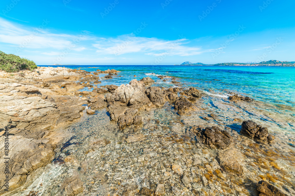Rocks and turquoise water in Rena Bianca beach