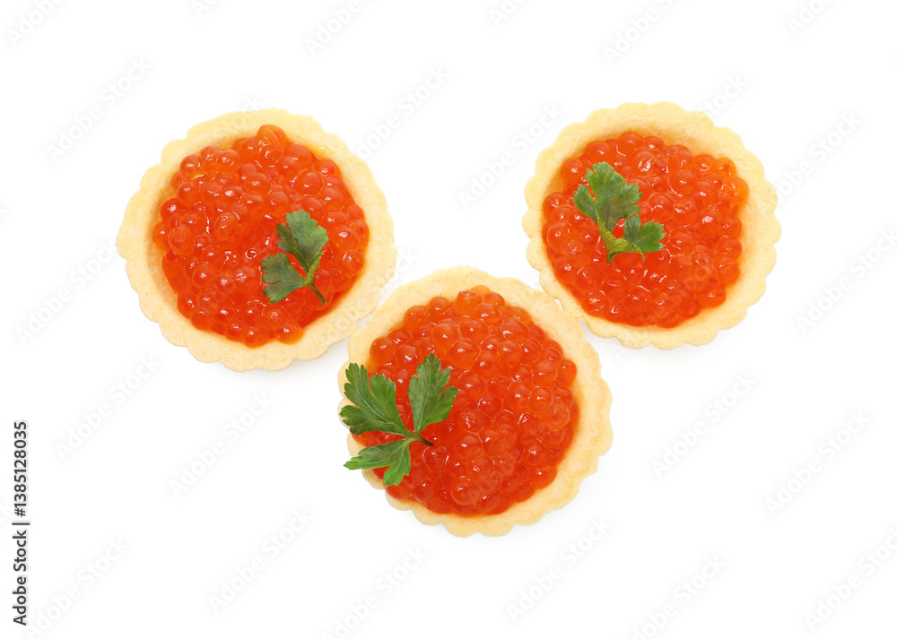 Tartlets with red caviar and parsley isolated on white, top view
