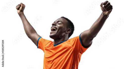 A cheerful African American soccer player celebrating a goal, arms raised in victory, wearing a modern football kit, showcasing joy and athleticism,