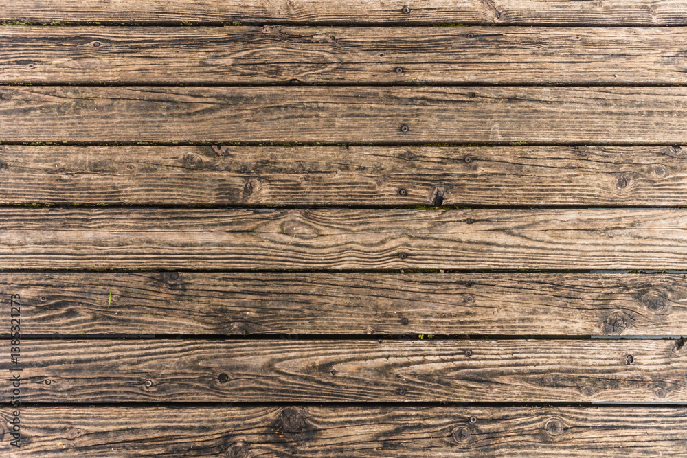 Wooden planks forming a rustic background texture from fimon lake, italy Wooden planks forming a rustic background texture from fimon lake, italy