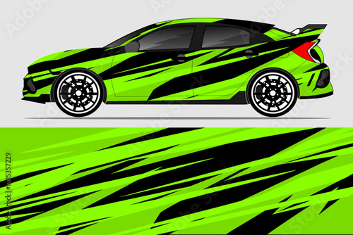 Vibrant green and black racing car design showcasing dynamic graphics and sleek lines on display
