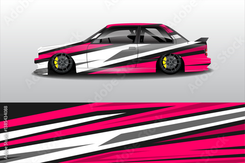 Stylishly modified car with vibrant pink and grey wrap, showcasing sleek design and racing wheels against a minimalist background