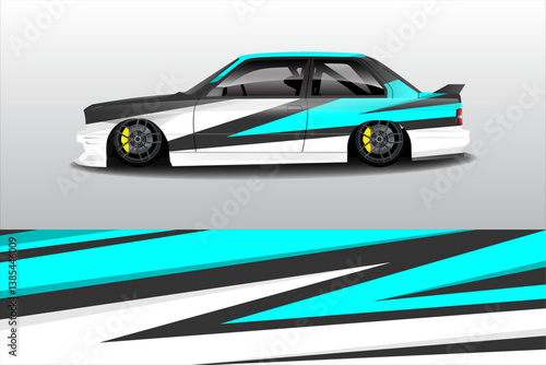 Sleek modified sports car with bold graphics, parked on a smooth surface, showcasing vibrant design